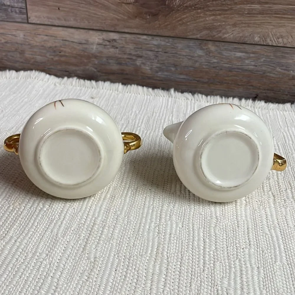 Cream and Sugar Porcelain Set with Gold Leaf Trim and Floral Design